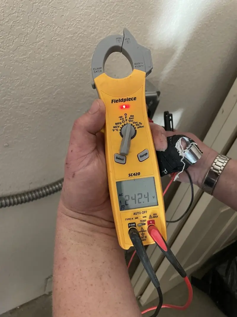 Voltage testing with clamp meter during Hot Tub / Pool Electrical Wiring in Bronxville